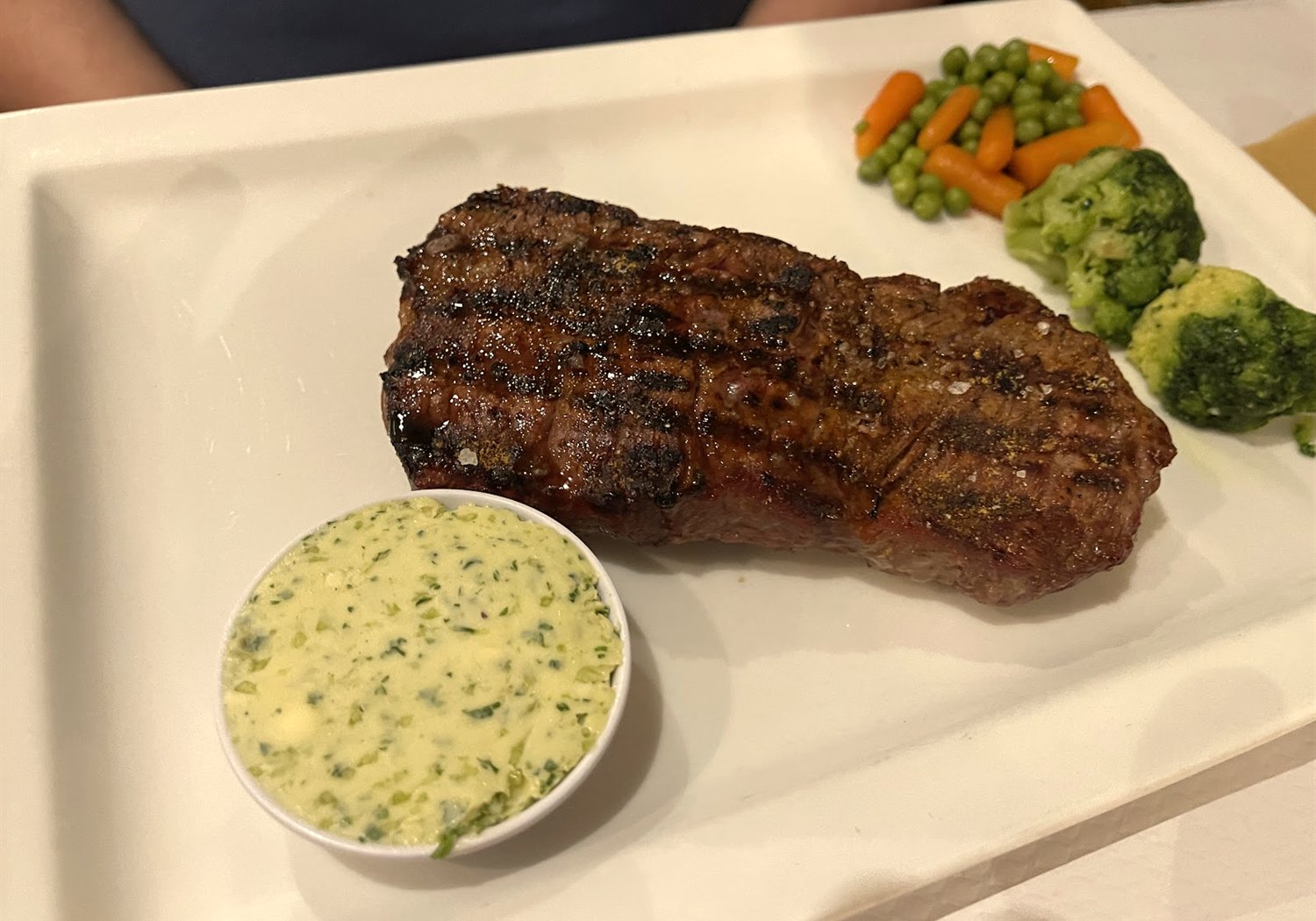 Chargrilled steak fresh off the grill at Restaurant Um Grill